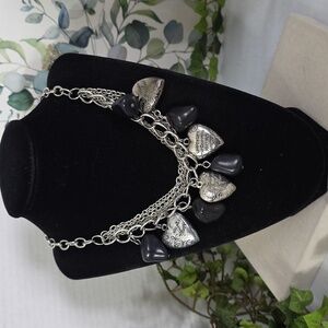 Silver Multi Chain Necklace with Black Stone and Puffy Religious Heart Charms